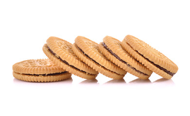 Sandwich cookie filled with chocolate cream on white
