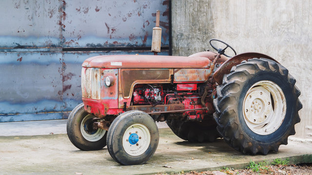 Closeup Shot of A Beautiful Red Vintage Tractor or Tracktor, Farm  / Agricultural Vehicle
