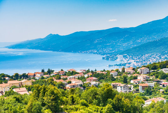 Opatija riviera and Kvarner bay view from above with hills and blue water in Croatia