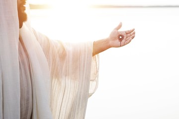Resurrected Jesus Christ with the scars of the nails on his hands