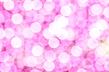 Blurred Pink Bokeh lights in the party as the abstract texture background, Soft Pink Christmas glitter lights