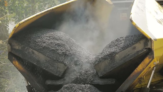 Tracked Pavers Laying Asphalt
