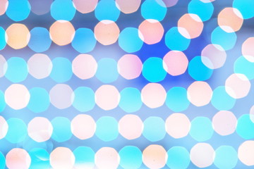 Blurred blue and soft pink Bokeh lights in the party as the abstract texture and background, Bokeh glitter color lights