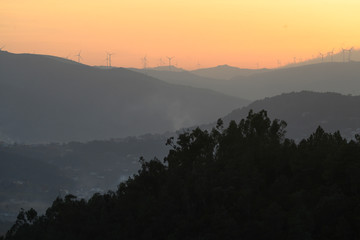 Silhouette of wind turbines on a hill, Tarouca, Viseu District, Douro Valley, Portugal