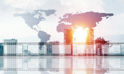 Concept of global communication and networking with world map over cityscape