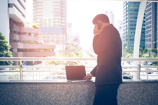 businessman and computer connect server network system online in data internet, security hacking system concept, block chain crypto currency, trading and money financial