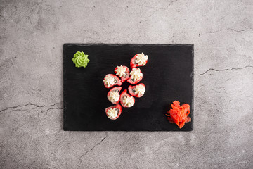 Japanese rolls with cream cheese on a slate board