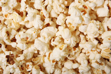 background of salted popcorn closeup