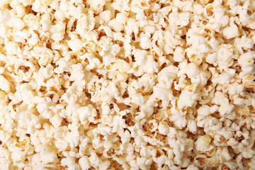 background of salted popcorn closeup