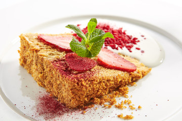 Traditional Russian Honey Cake Medovik on Restaurant Plate Isolated