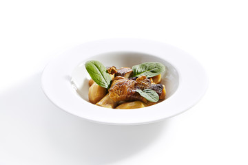 Roasted Boletus or Porcini Mushrooms with Baked Potatoes Isolated