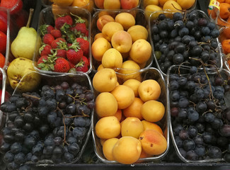 Naklejka na ściany i meble various fruits (Strawberry, black grapes and apricot)