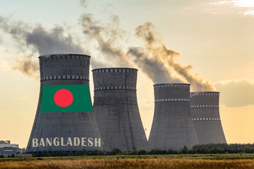 Nuclear plant chimneys displaying flag of Bangladesh with according text. Energy pollution...