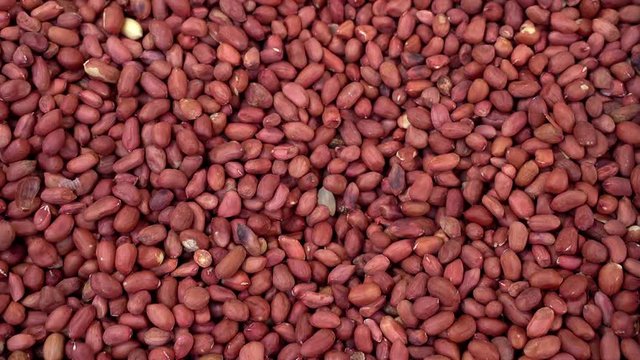 Background of raw peanut in the shell on the market