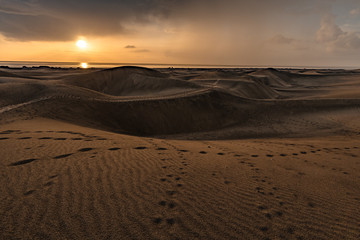 Fototapeta na wymiar Maspalomas dunes in sunrise light in Gran Canaria in Canary Islands.