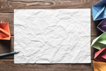 Concept of inspiration and creativity with paper ships. Place your text