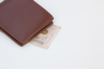 wallet with money isolated on white background