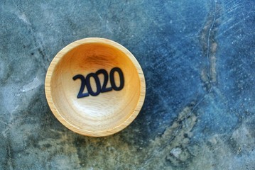 calendar on 2020 on Wooden background.New year concept.