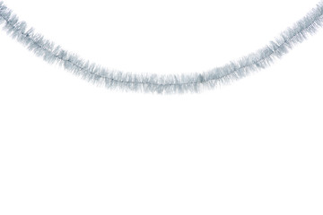 Christmas tinsel hanging on white background