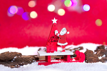 PaPá noel o santa claus en trineo y fondo rojo con luces. Feliz navidad postal