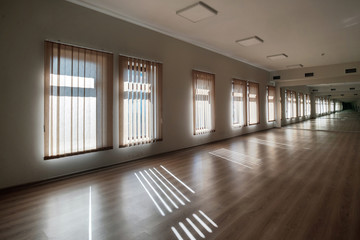 Empty room interior with closed windows