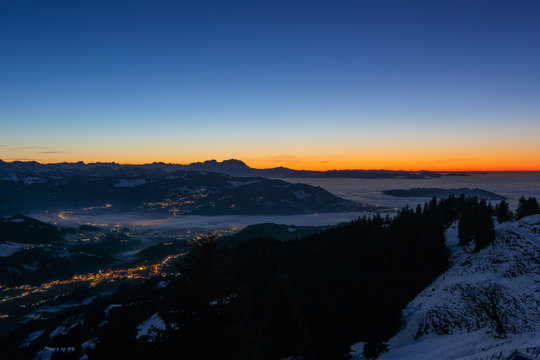 Night lights of Hittisau and Andelsbuch after sunset in winter. Bregenzerwald, Vorarlberg, Austria