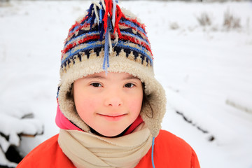 Portrait of beautiful little girl in the winter