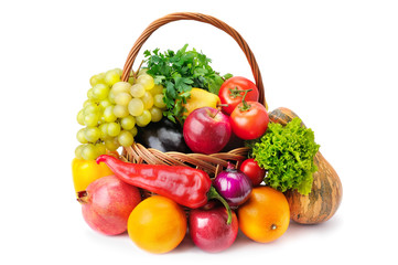 Obraz na płótnie Canvas Vegetables and fruits in a basket isolated on white background.