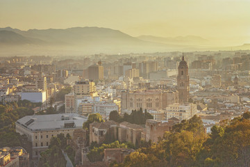 Cityscape of Malaga in sunset, Spain