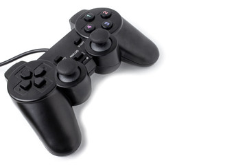 Joystick for playing top view isolated on white background with place for text. Black remote control for video games