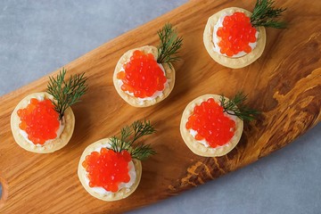 Tartlets with red caviar.