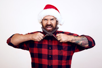 Handsome guy advertising something.. Time to celebrate. Happy new year. Barber scissors, straight...