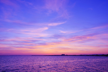 Colorful sunset over the sea. Purple sky. - Powered by Adobe