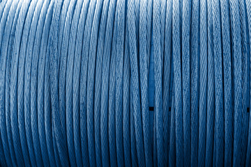 Large spool of electric cable blue toned