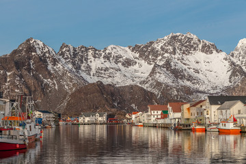 Fototapeta na wymiar The view of the fisherman village with typical rorbu houses and boats in Lofoten islands, Norway.