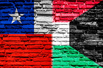 Flag of Chile and Kuwait on brick wall