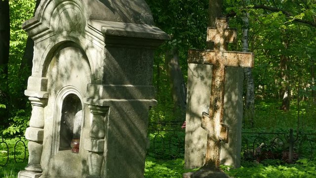 old grave cross, old graves at cemetery