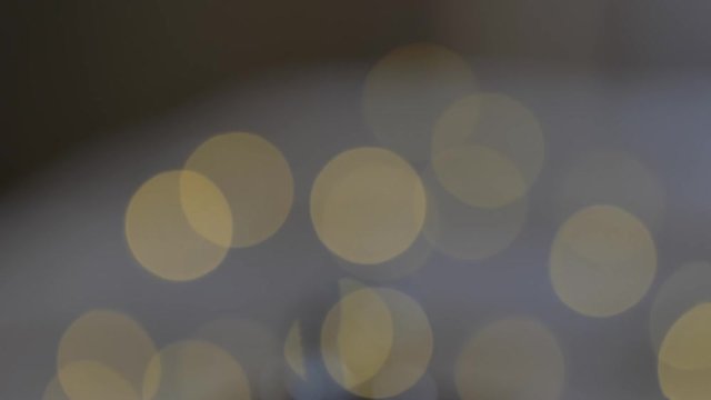 Rack focus engagement rings bokeh lights background