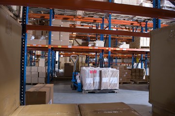 Boxes On Shelves In Warehouse