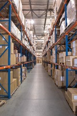 Boxes On Shelves In Warehouse