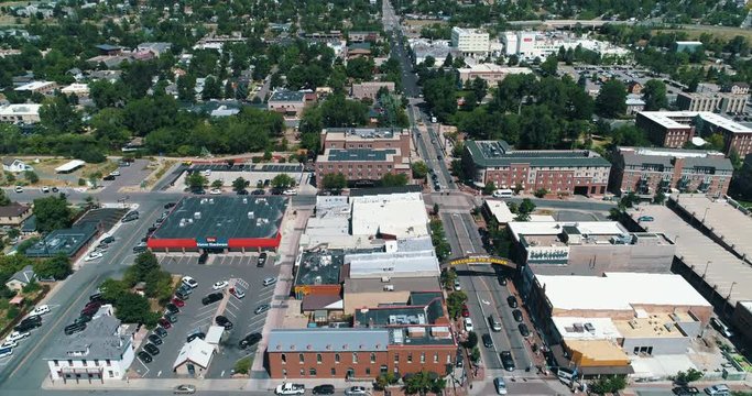 Aerial of downtown Golden, Colorado and mountain foothills