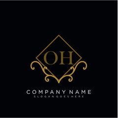 Initial letter OH logo luxury vector mark, gold color elegant classical 