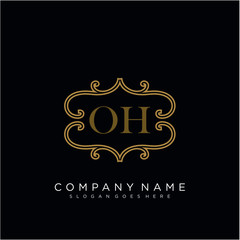 Initial letter OH logo luxury vector mark, gold color elegant classical 