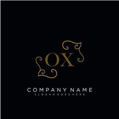 Initial letter OX logo luxury vector mark, gold color elegant classical 