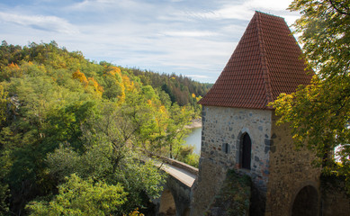 Castle tower higher than the tops of trees.