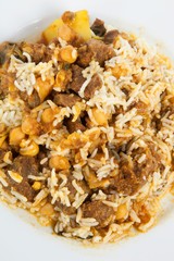 Close-up of rice and meat in plate