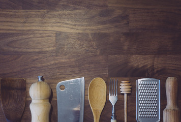 Сooking background frame. Kitchen utensils on a wooden table in the kitchen. Copy space text - Powered by Adobe