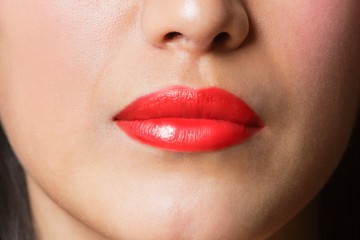 Fototapeta premium Cropped portrait of serious Hispanic woman staring