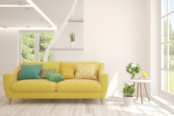 Stylish room in white color with sofa and summer landscape in window. Scandinavian interior design. 3D illustration