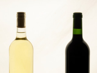 Close up of two bottles of wine unlabelled
